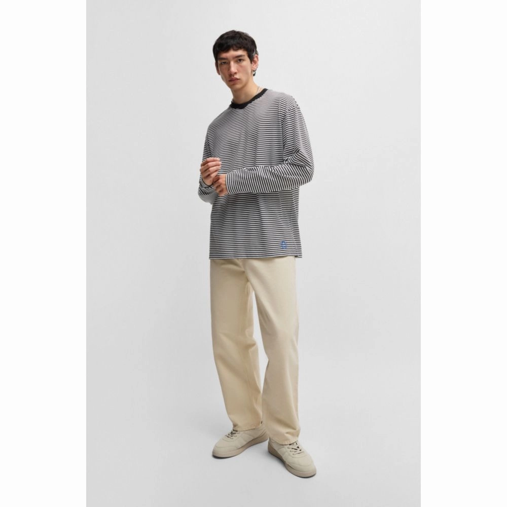Baggy-fit trousers in cotton canvas