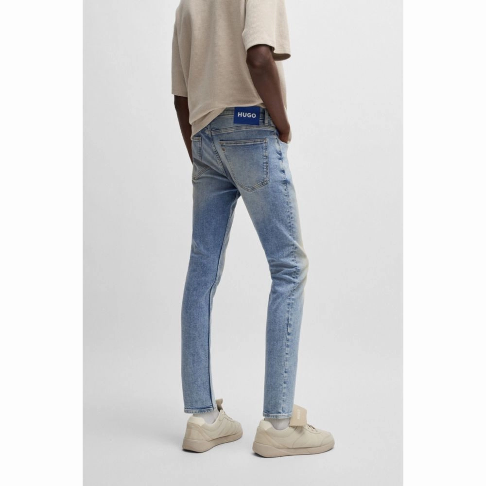 Extra-slim-fit jeans in stonewashed blue stretch denim