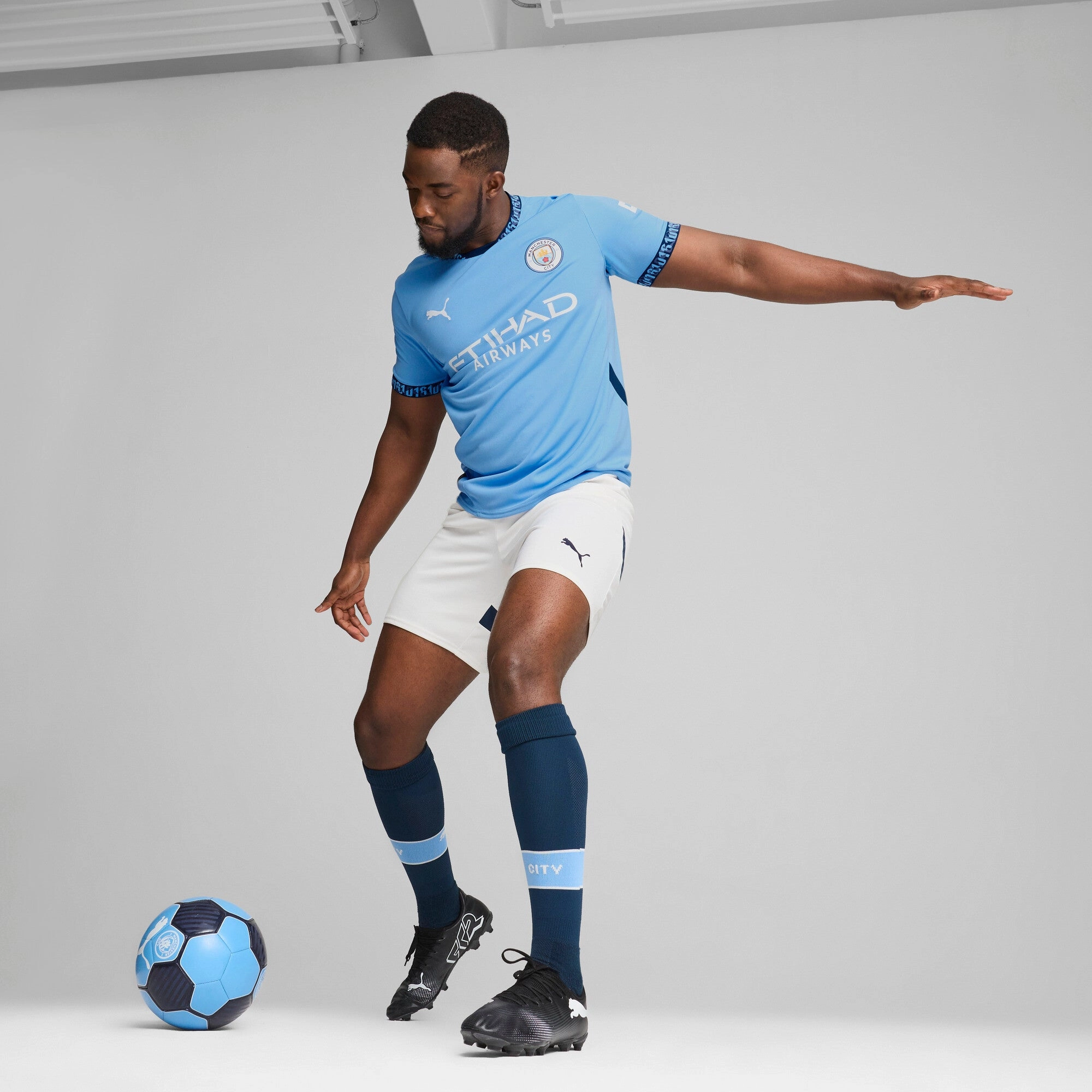 PUMA Men's Manchester City 24/25 Replica Home Soccer Jersey