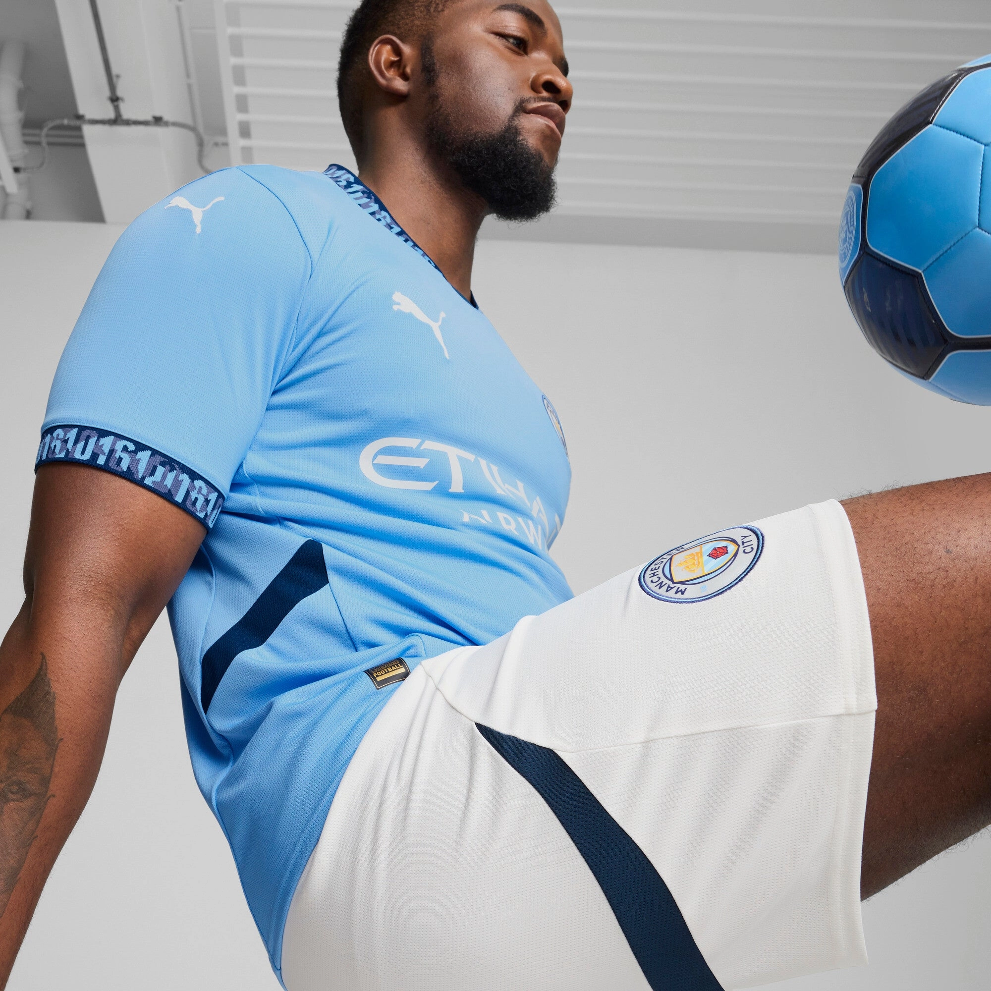 PUMA Men's Manchester City 24/25 Replica Home Soccer Jersey
