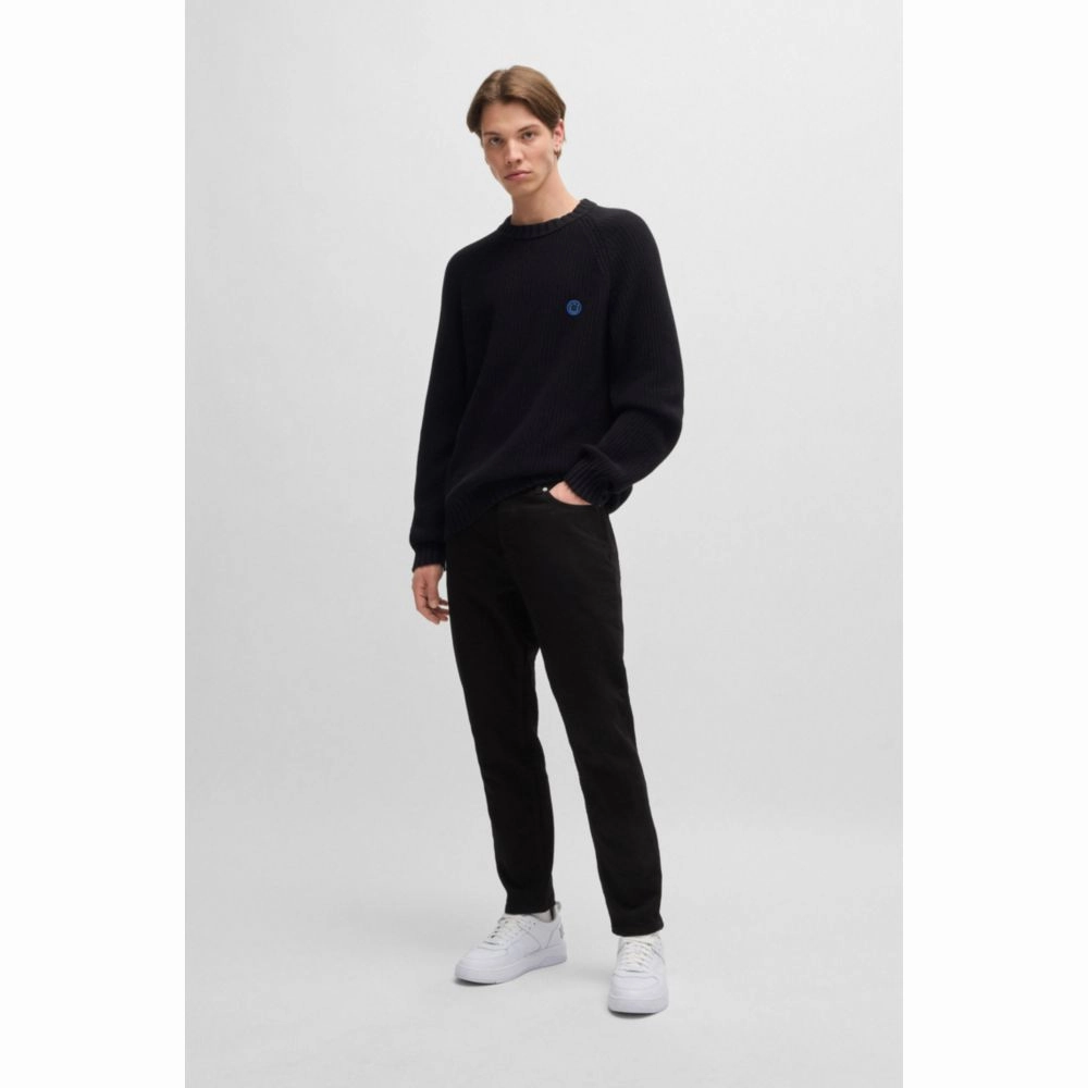 Tapered-fit jeans in black stretch denim